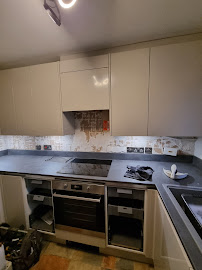 Modern gloss kitchen installation by HSS Carpentry Watford