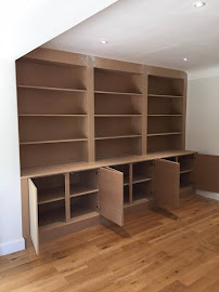 Bespoke fitted shelving and storage unit built by HSS Carpentry